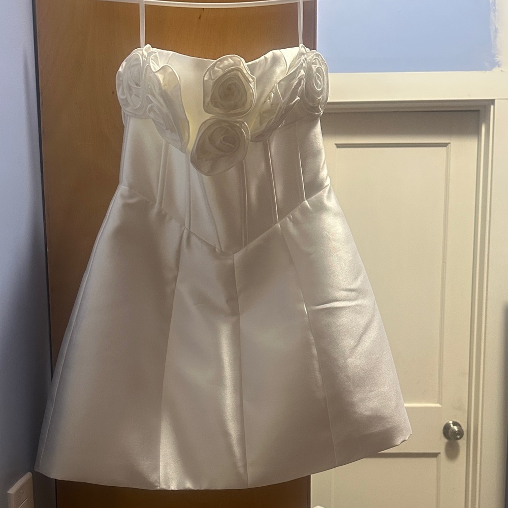 Elegant Strapless White Mini Dress with Floral Accents